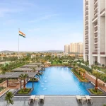 Residential towers with a swimming pool and landscaped gardens
